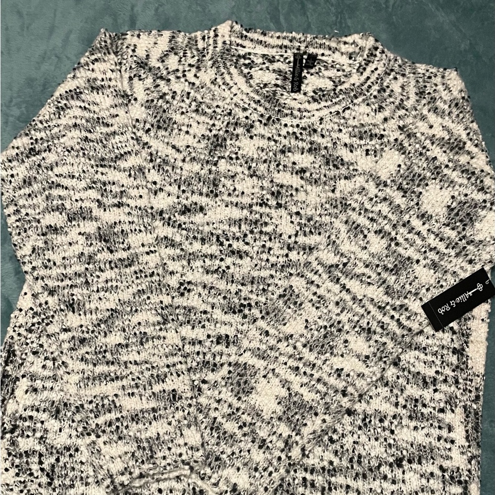 BLACK & WHITE Marble Knit Long Sleeve Crew Neck Sweater with Dolphin Hem…